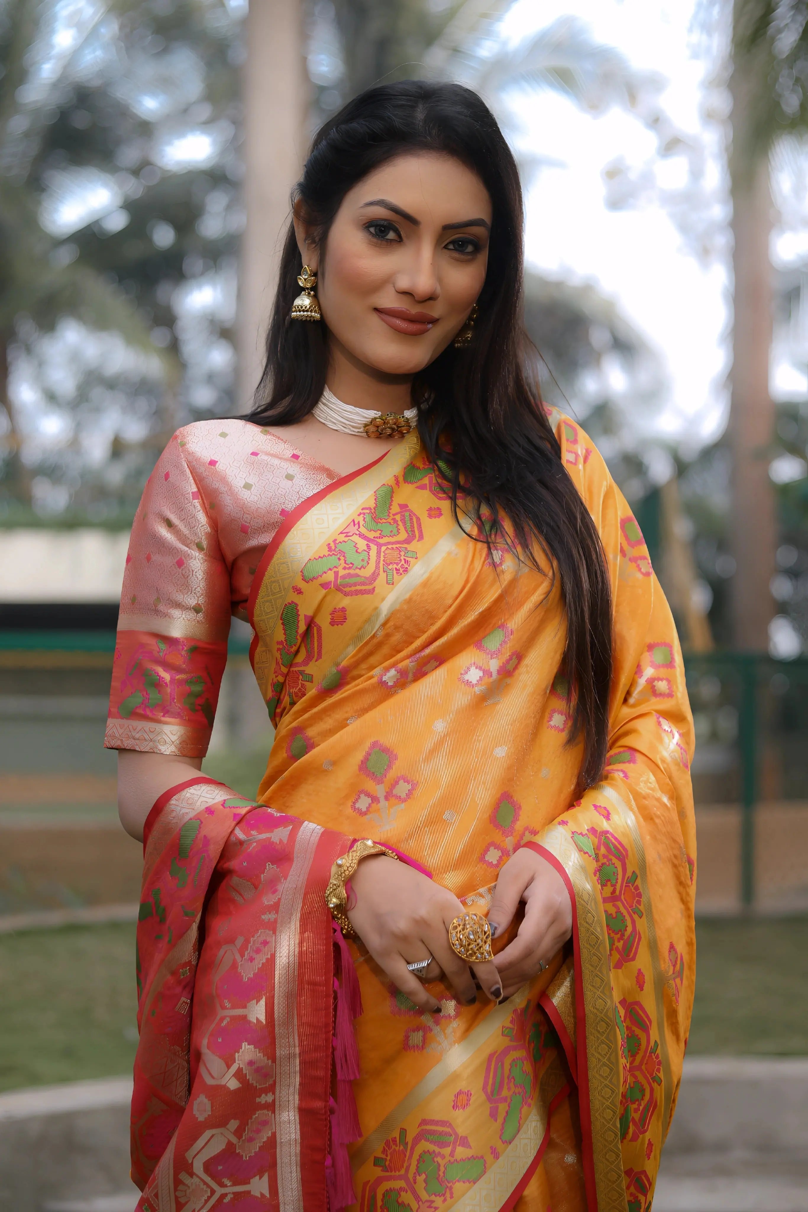 Orange Ikkat Patola Weaving Organza Silk Saree